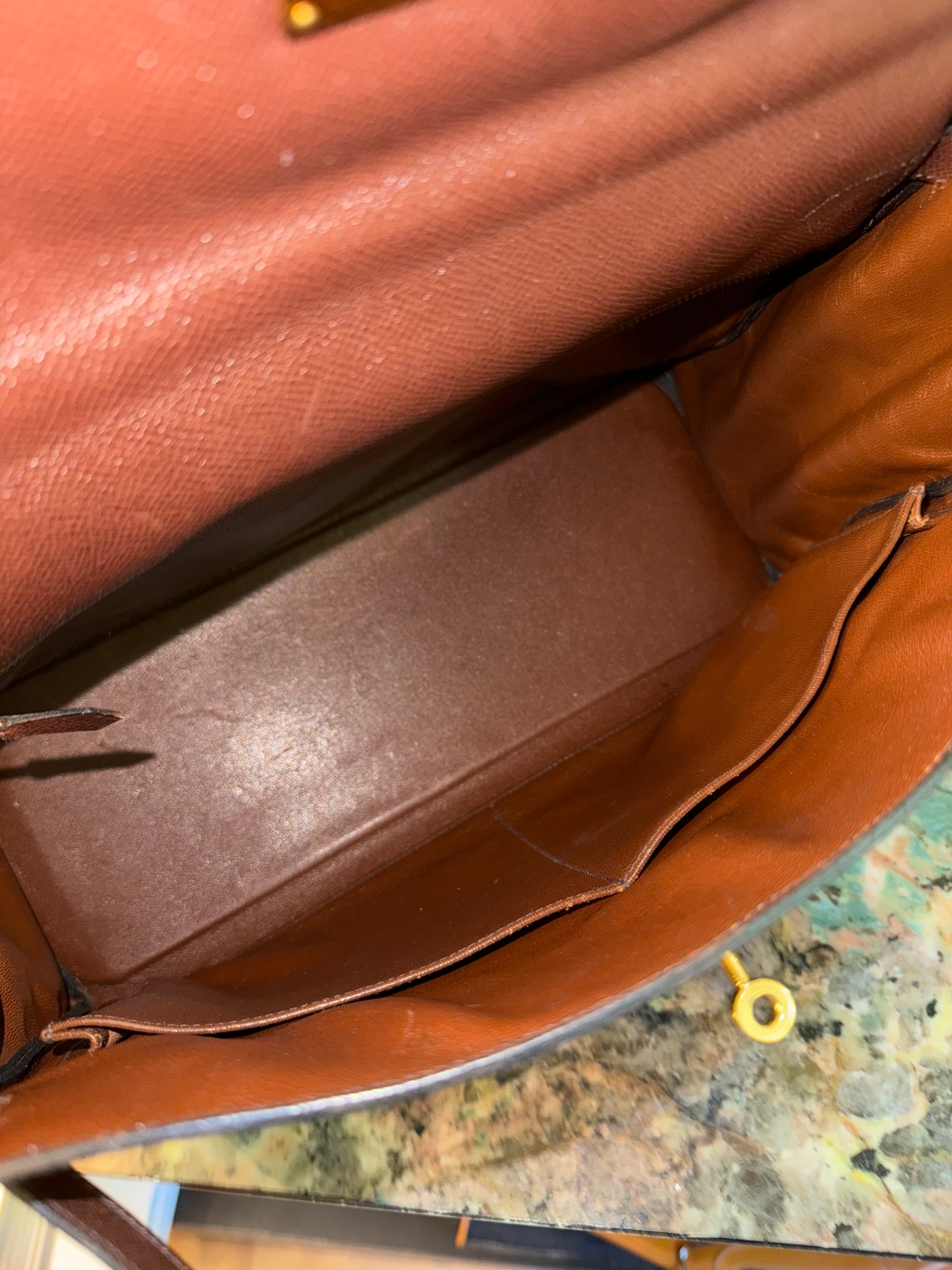 HERMÈS BROWN COURCHEVEL KELLY 35 HANDBAG