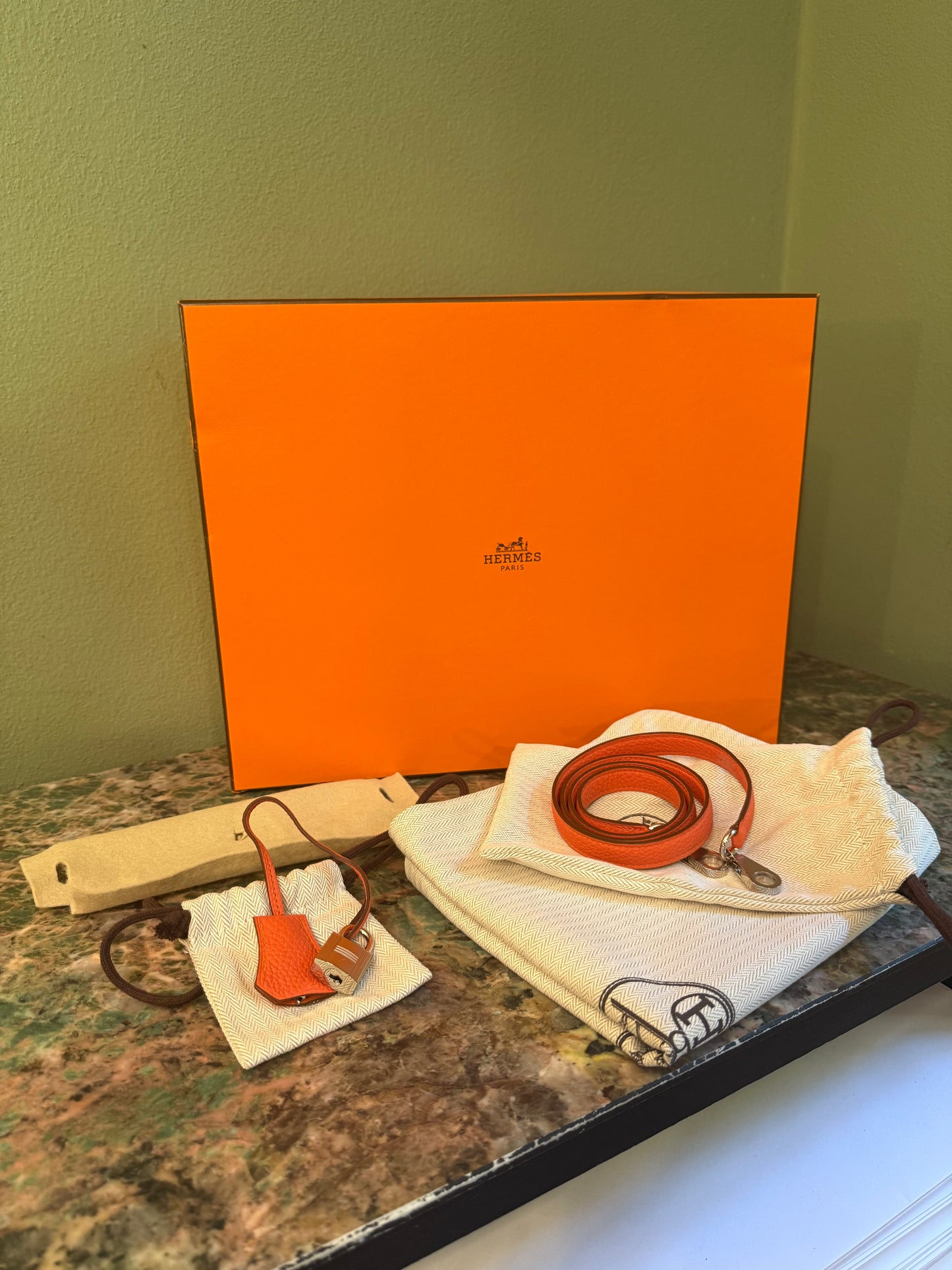HERMÈS ORANGE TOGO KELLY 25 HANDBAG