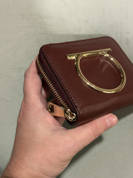 SALVATORE FERRAGAMO BURGUNDY COMPACT ZIPPY WALLET