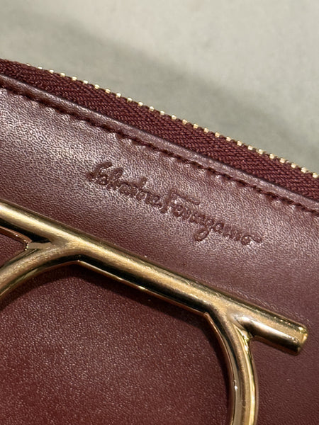 SALVATORE FERRAGAMO BURGUNDY COMPACT ZIPPY WALLET