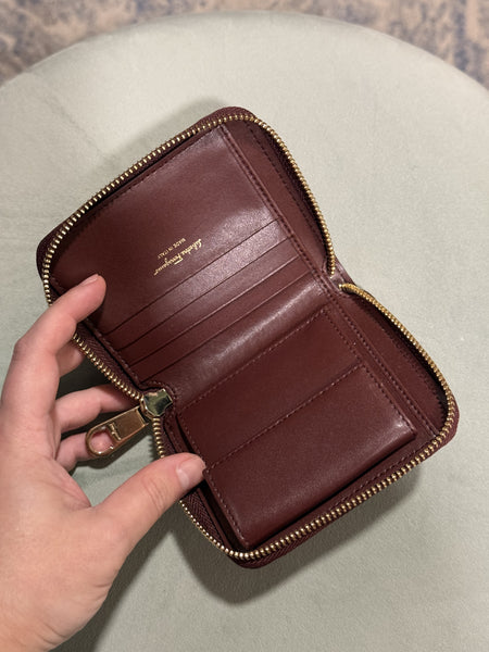 SALVATORE FERRAGAMO BURGUNDY COMPACT ZIPPY WALLET