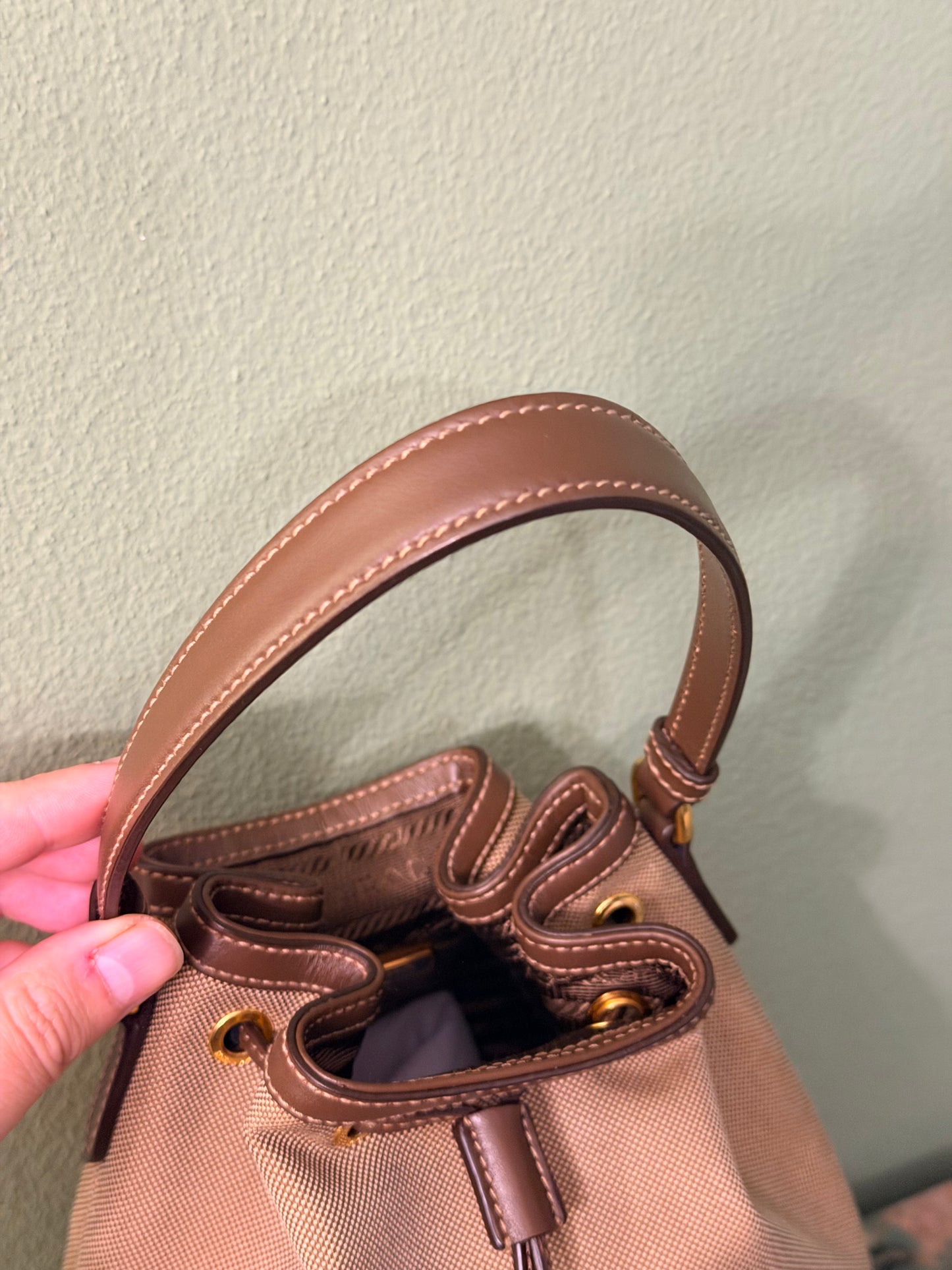 PRADA BROWN LOGO SMALL BUCKET TOP HANDLE CROSSBODY BAG