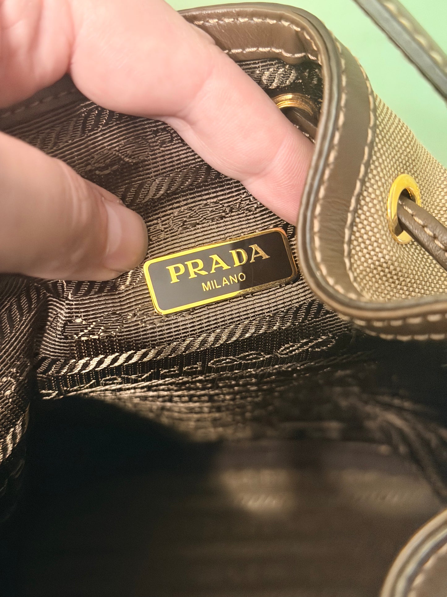 PRADA BROWN LOGO SMALL BUCKET TOP HANDLE CROSSBODY BAG