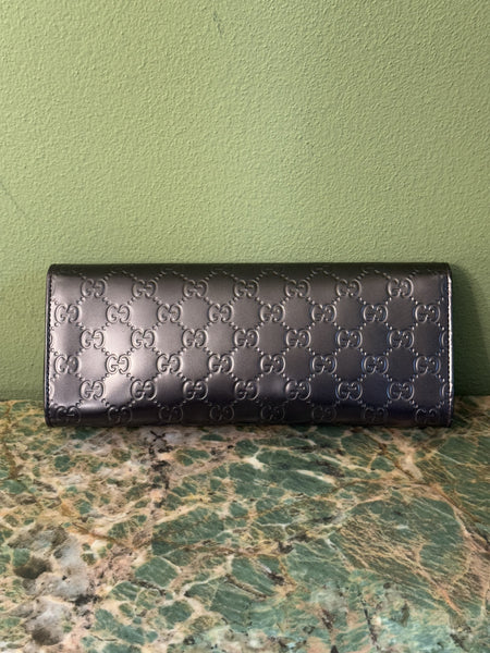 GUCCI  METALLIC PURPLE GUCCISSIMA EAST WEST CLUTCH