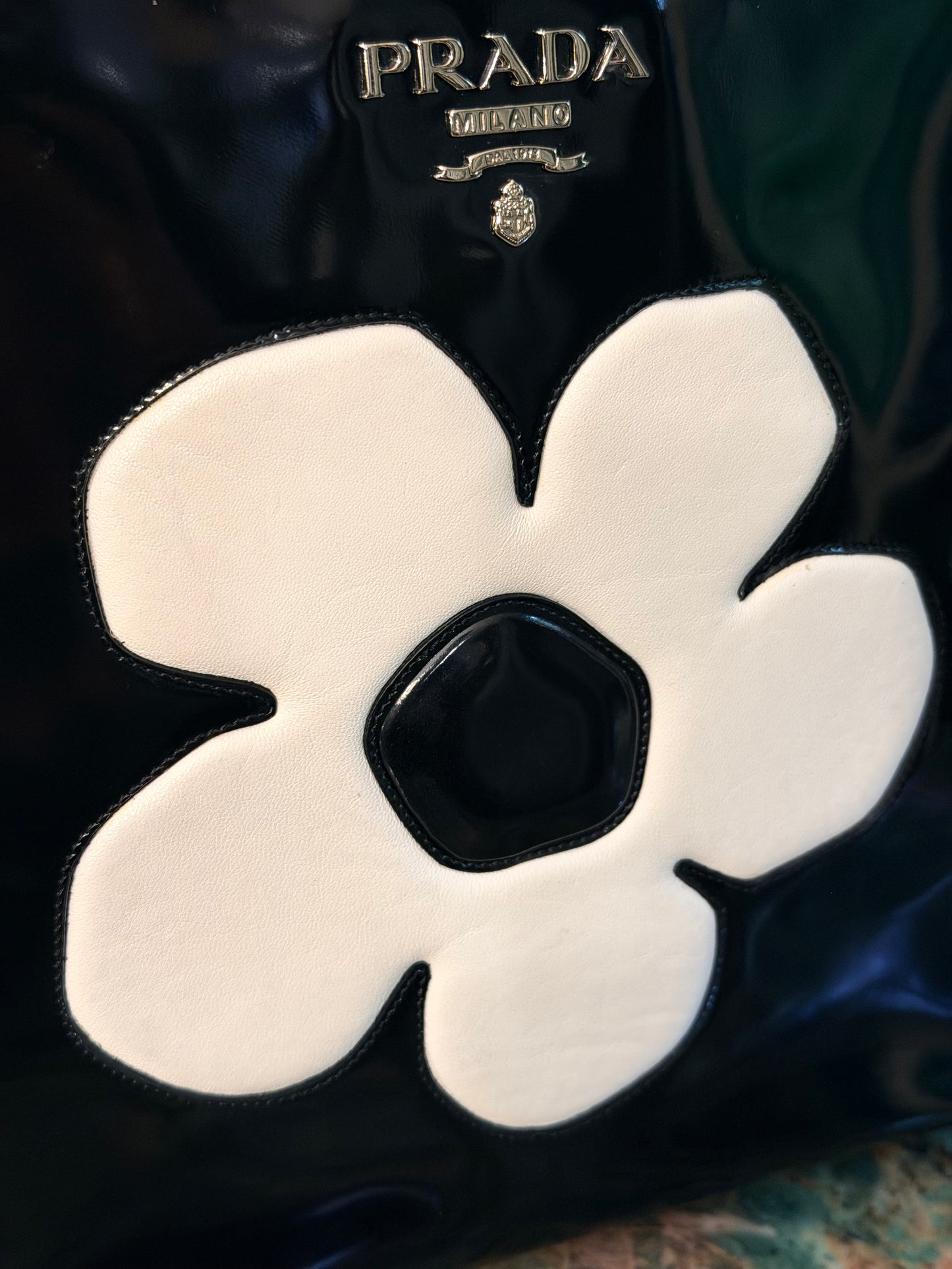 PRADA BLACK SPAZZOLATO FLOWER BUCKET HANDBAG