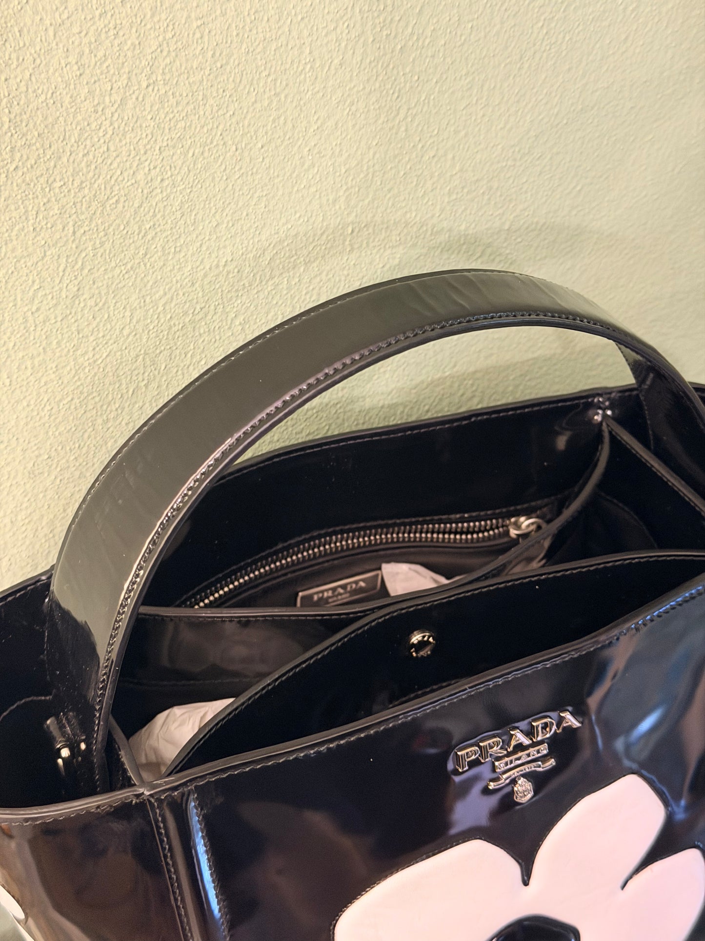 PRADA BLACK SPAZZOLATO FLOWER BUCKET HANDBAG