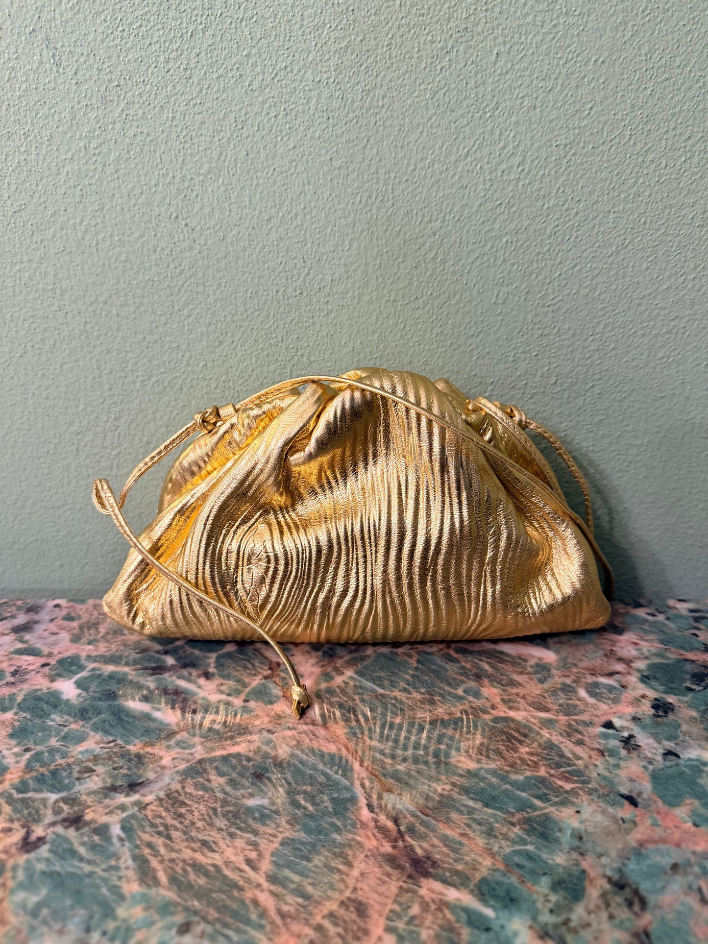 BOTTEGA VENETA GOLD MINI POUCH CROSSBODY BAG