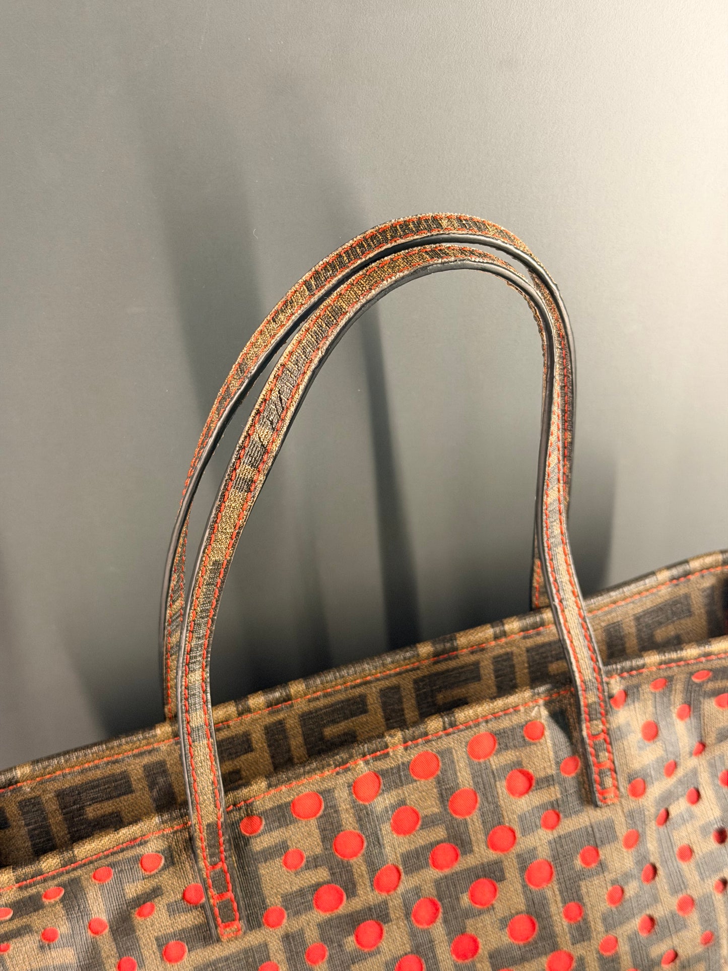 FENDI PERFORATED ZUCCA SMALL ROLL TOTE HANDBAG
