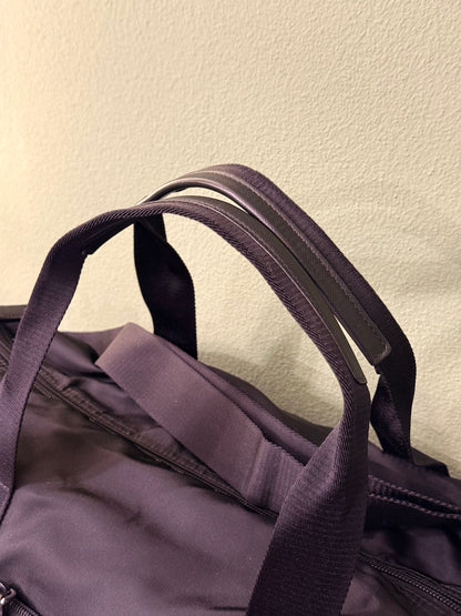 PRADA BLACK NYLON ROUND TRAVEL BAG