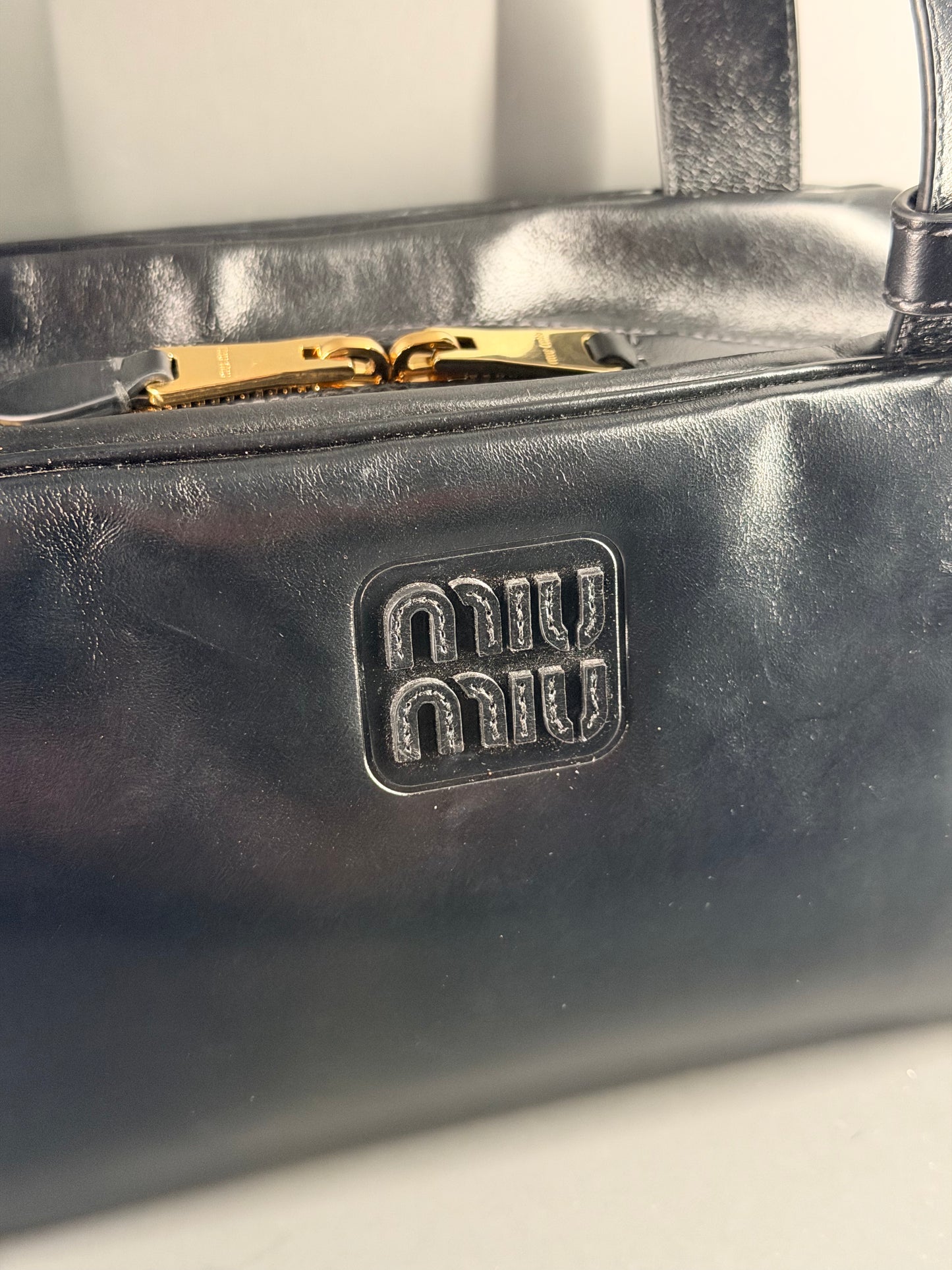MIU MIU BLACK SOFT LUX BAULETTO HANDBAG