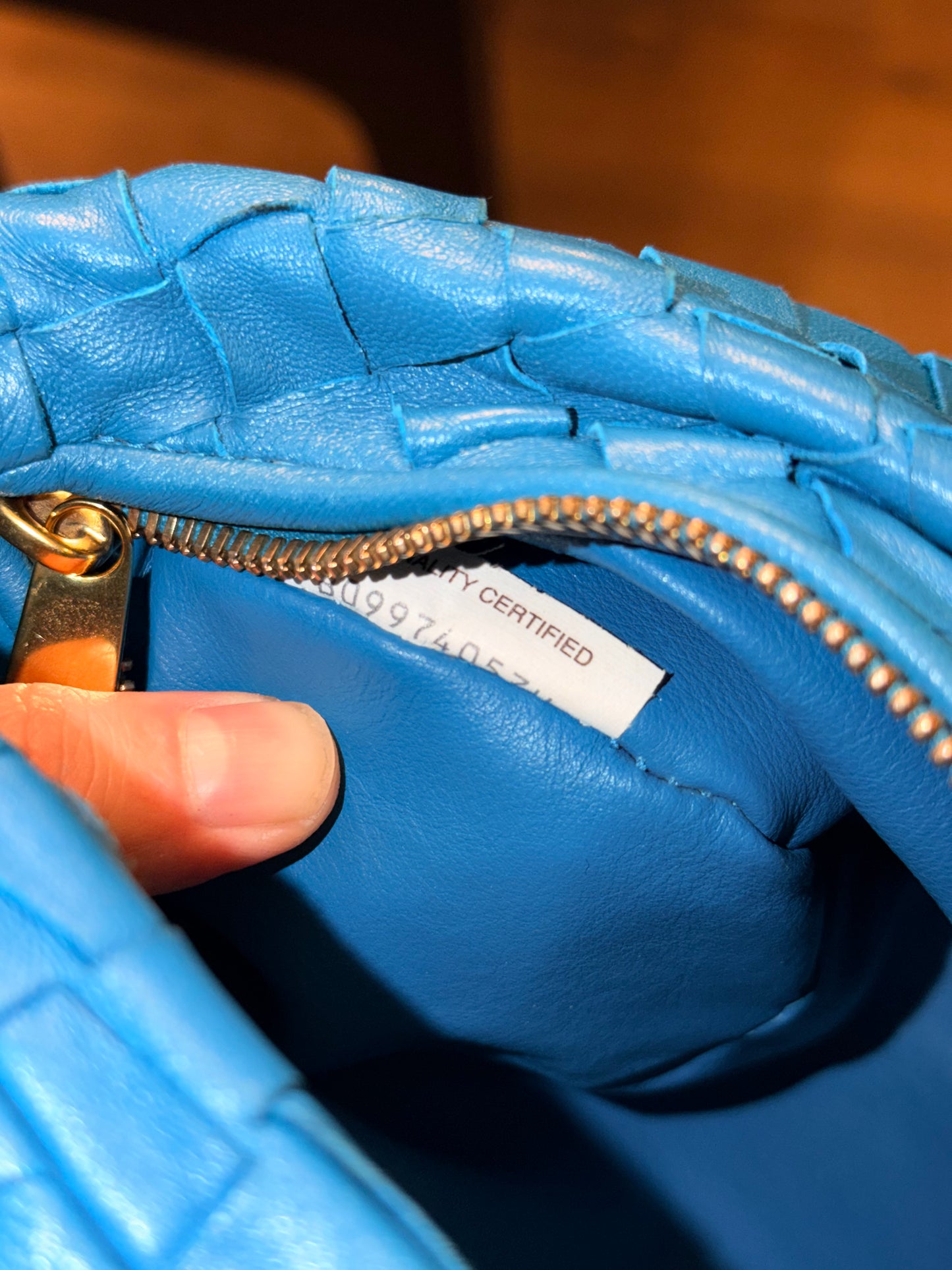 BOTTEGA VENETA BLUE MINI JODIE HANDBAG