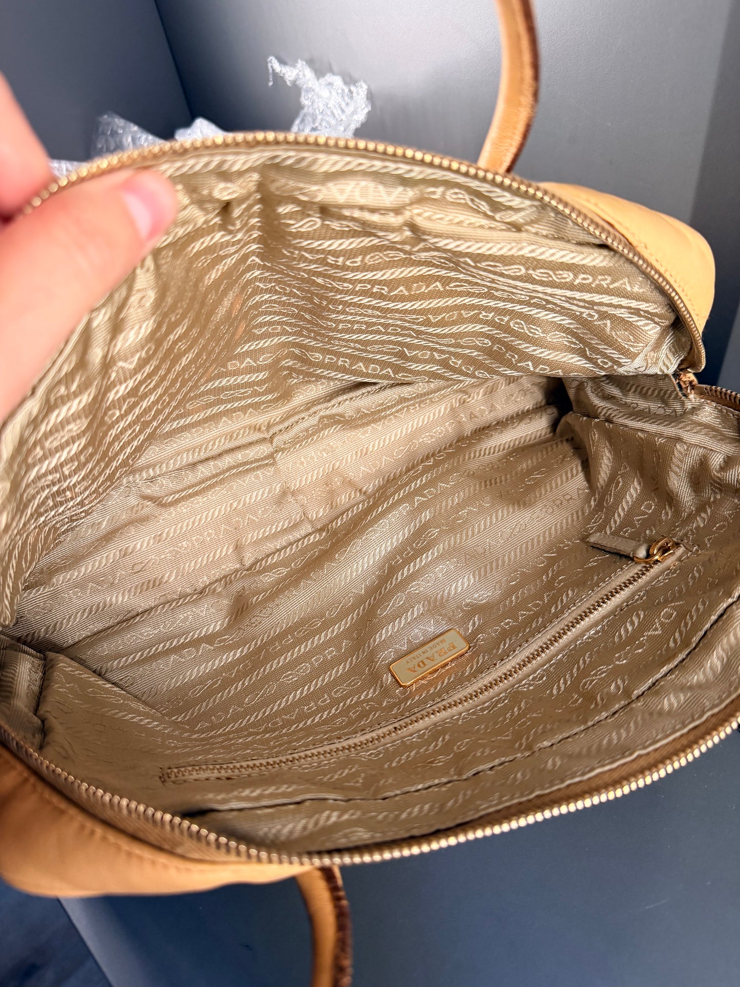 PRADA BEIGE GROMMET BAULETTO HANDBAG