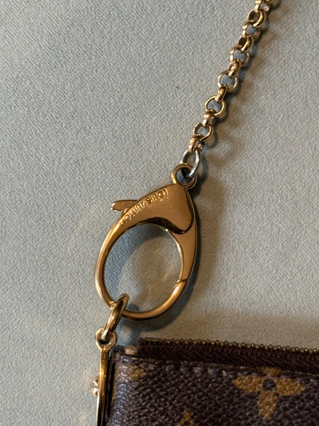 LOUIS VUITTON MONOGRAM MILLA CLUTCH