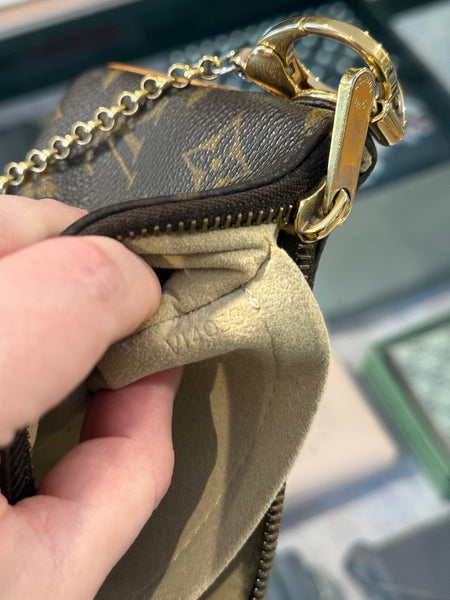 LOUIS VUITTON MONOGRAM MILLA CLUTCH