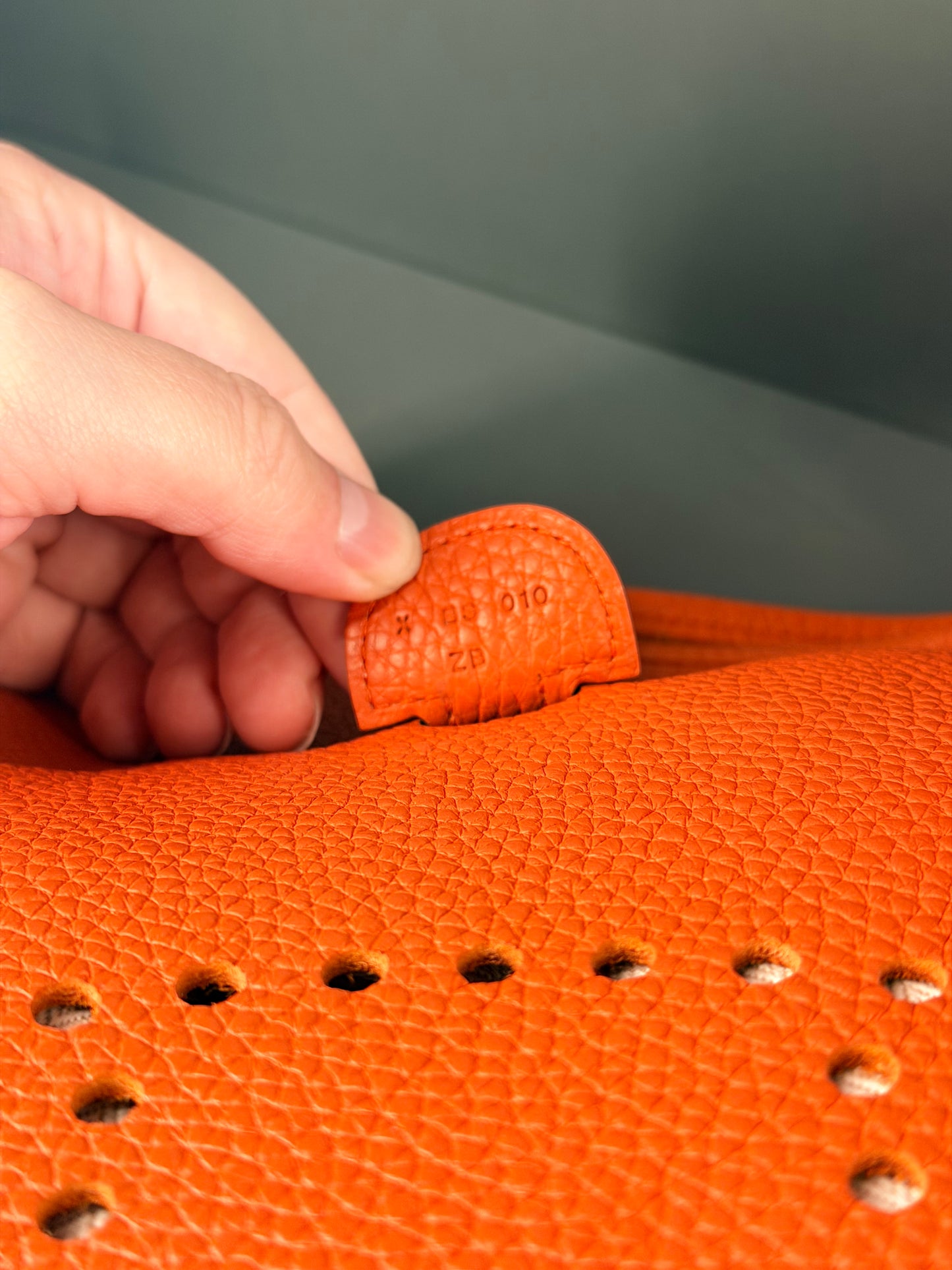 HERMÈS ORANGE TOGO EVELYNE CROSSBODY BAG