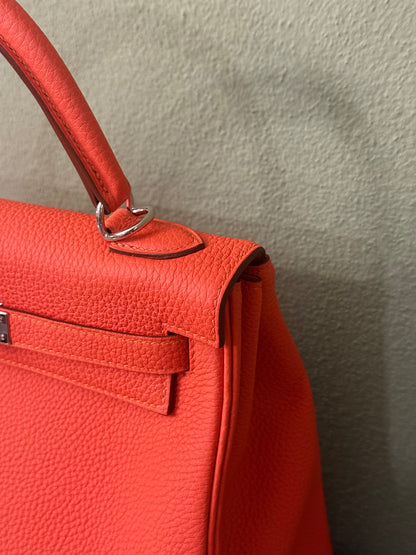 HERMÈS ORANGE TOGO KELLY 25 HANDBAG