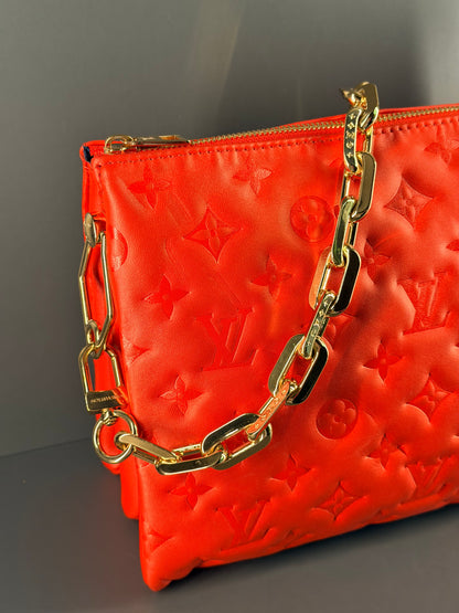LOUIS VUITTON RED COUSSIN PM CROSSBODY BAG
